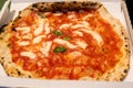 A closeup of an Italian pizza Margherita in a box Royalty Free Stock Photo