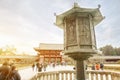 Closeup Japanese ancient steel lantern of Todaiji Temple on big red temple gate and many tourist