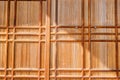 Closeup Japanese ancient wooden doors and shade of shadow background and wallpaper Royalty Free Stock Photo