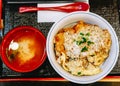 Closeup Japanese food ,Katsudon is Japanese fast food bowl of rice topped with fried pork cutlet and eggs with soup Royalty Free Stock Photo