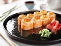 Closeup of japanese rolls on a dark plate