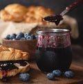 Jar and spoon of blueberry Jam Royalty Free Stock Photo