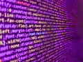 Closeup of Java Script and HTML code. Programmer working on computer screen. Lines of code of a software with several colors. Royalty Free Stock Photo