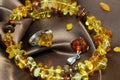 Closeup jewerly with authentic natural baltic amber : bracelet, silver ring and pendant