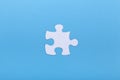 Closeup of jigsaw puzzle on blue background Missing jigsaw puzzle piece, business concept for completing the piece Royalty Free Stock Photo