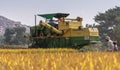 Closeup of John Deere pick thresher, Hunumanahalli, Karnataka, India