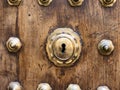 Closeup keyhole on wooden andalusian door