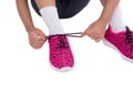 Closeup on kid hands tying her shoes Royalty Free Stock Photo