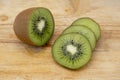 Closeup Kiwi fruit slice on the old wood butcher Royalty Free Stock Photo