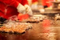 Closeup Kobe beef stick on a hot pan to sale for customer at Kuromon market on blurry hands of chef cooking background. Kobe beef