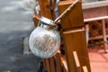 Closeup of lamps hanging in outdoor garden