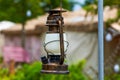 Closeup of lamps hanging in outdoor garden