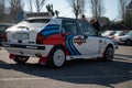 Closeup of the Lancia Delta HF covered in stickers Michelin parked on the street