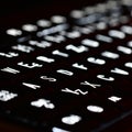 Closeup of laptop keyboard illumination. Concept for Computing and Modern Technology. Computer, network, internet. Royalty Free Stock Photo