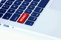 Closeup of a laptop keyboard with a money button Royalty Free Stock Photo