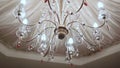 Closeup Large Brilliant Lustre under White Ceiling