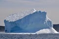 Closeup of large iceberg in bay outside St. John\'s with sunlit and shaded sections