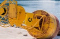 Closeup of large ocean buoy on pier