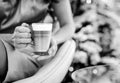 Closeup on latte macchiato in hand of woman Royalty Free Stock Photo