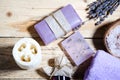 Closeup lavender soap lie on a wooden surface. Body and face care. CPA attributes.