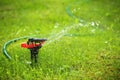 Closeup of lawn sprinkler Royalty Free Stock Photo