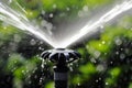 closeup of a lawn sprinkler head spraying water Royalty Free Stock Photo