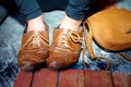 Closeup, leather and feet with shoes for fashion, vintage style or aesthetic and bag for lifestyle or trend. Person