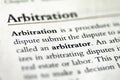 Closeup of a legal textbook with a chapter about arbitration and arbitrators in focus Royalty Free Stock Photo