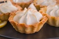 Closeup lemon tart. Homemade Lemon Tartlets with Italian Meringue Ready to Eat. Royalty Free Stock Photo