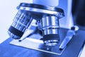 Closeup lens of a modern microscope in a research lab. Selective focus Royalty Free Stock Photo