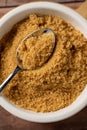 Closeup light brown granulated sugar in a bowl. Royalty Free Stock Photo