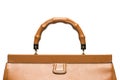 Closeup of light brown leather handbag handle