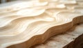Closeup of a lightcolored wooden slab with wavy grain pattern on a workbench Royalty Free Stock Photo