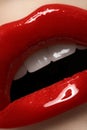Closeup lips with fashion glossy red make-up