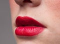 Closeup lips make-up zone. Mat red.