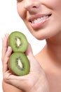 Closeup lips of smiling woman with kiwi