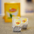 Closeup of Lipton brand black tea in bags on the table