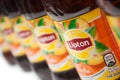 Closeup of Lipton ice tea in plastic bottles on white background