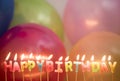 Closeup of lit birthday candles birthday wishes concept Royalty Free Stock Photo