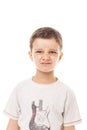 Closeup of a little boy with grumpy expression Royalty Free Stock Photo