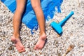 Closeup of little girl legs on tropical beach with Royalty Free Stock Photo