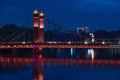 Closeup of the Lize bridge in Guilin, China at night with its reflection on the water surface Royalty Free Stock Photo