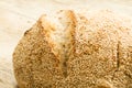 Closeup of a loaf of homemade bread with sesame seeds in selective focus