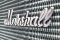 Closeup of the logo on a retro look Marshall Kilburn bluetooth speaker.