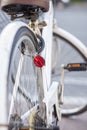 Closeup look of a white modern and vintage good looking bicycle.
