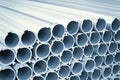 Closeup of a lot of aluminum pipes for manufacturing