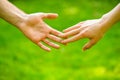 Closeup of loving couples holding hands while walking. Female and male hand together. Couple holding hands in the Park Royalty Free Stock Photo