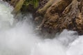 Closeup of Lower falls Yellowstone river. Raging waters. Spray from waterfall.