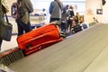 Closeup of luggage bag on airport conveyor belt for pickup