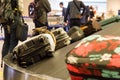 Closeup of luggage bag on airport conveyor belt for pickup Royalty Free Stock Photo